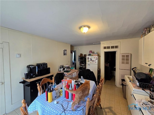 502 N Prospect St, Bowling Green, OH 43402 - dining area with light tile patterned floors