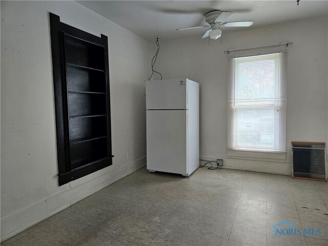 502 N Prospect St, Bowling Green, OH 43402 - interior space with freestanding refrigerator, a ceiling fan, and healthy amount of natural light