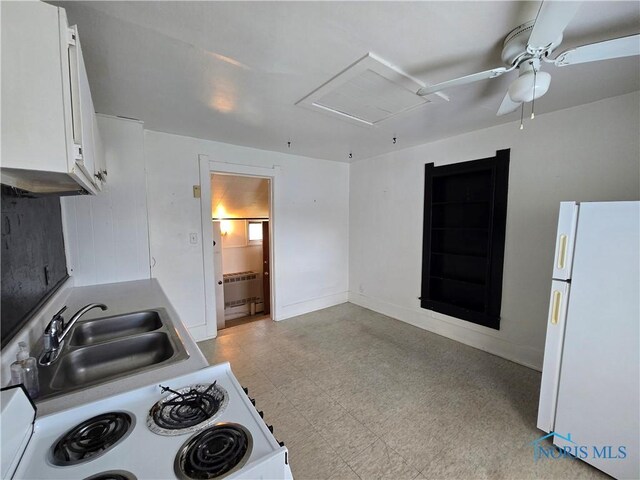 502 N Prospect St, Bowling Green, OH 43402 - kitchen with white appliances, a sink, light floors, white cabinetry, and a ceiling fan