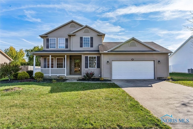 front facade featuring cooling unit, a garage, a front lawn, and a porch