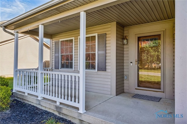 entrance to property with a porch