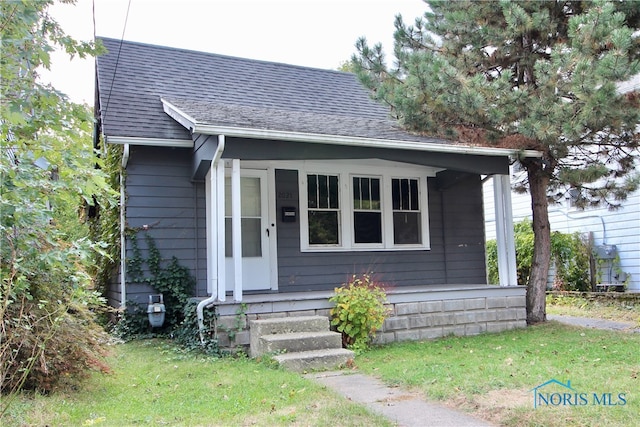 exterior space with a front lawn