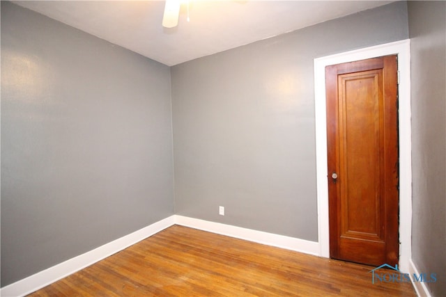 unfurnished room featuring hardwood / wood-style floors