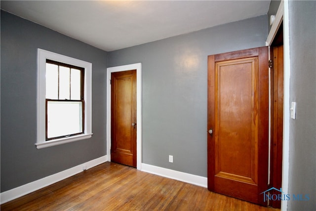 unfurnished bedroom with light hardwood / wood-style flooring