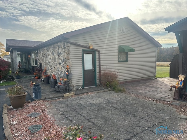 back of house featuring a patio