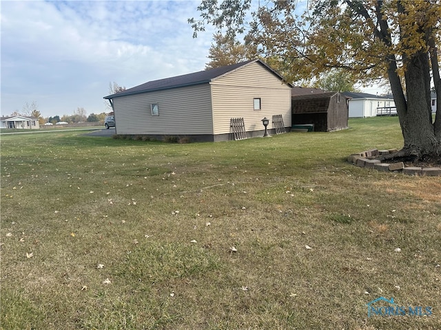 view of property exterior featuring a lawn