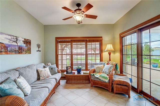 living room with plenty of natural light and ceiling fan