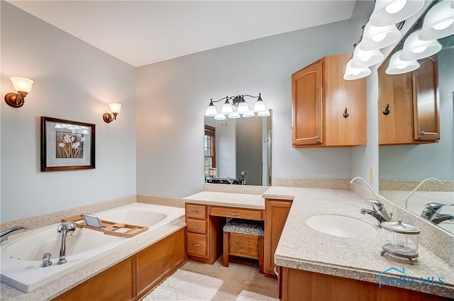 bathroom featuring tile patterned flooring, vanity, and a bath