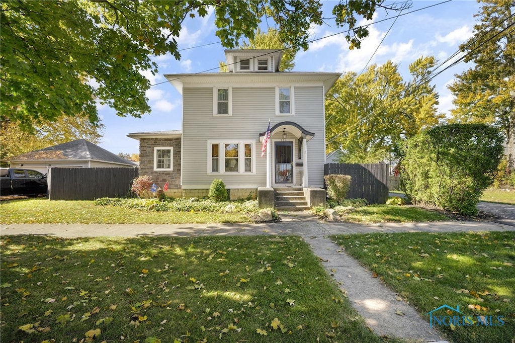 italianate home with a front lawn