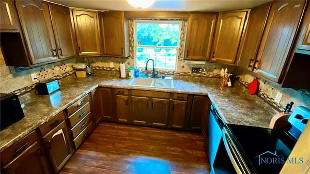 2263 Country Squire Ln, Toledo, OH 43615 - kitchen with stainless steel range with electric stovetop, a sink, dark wood-style flooring, and stone countertops