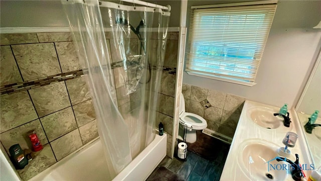 2263 Country Squire Ln, Toledo, OH 43615 - bathroom featuring tile walls, shower / tub combo with curtain, toilet, and double vanity