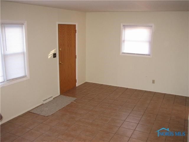 view of tiled empty room