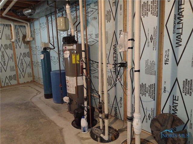 utility room with gas water heater