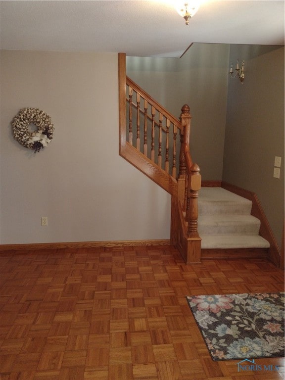 stairway with parquet floors