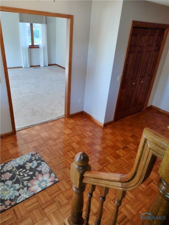 interior space with light parquet floors