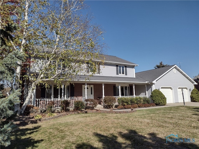 view of front facade featuring a porch, a front lawn, and a garage