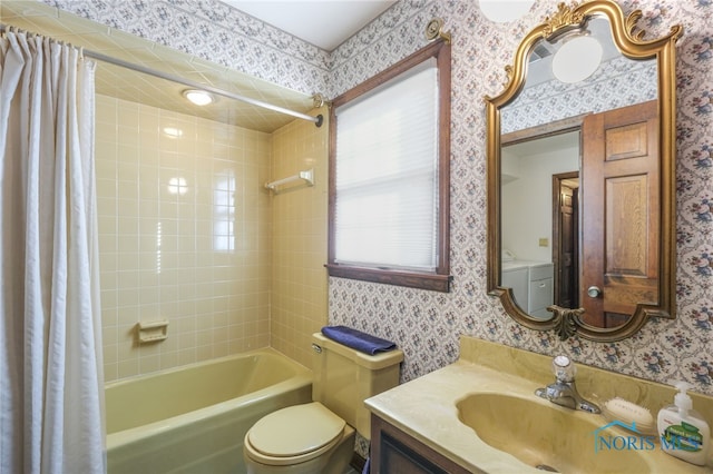 full bathroom featuring toilet, vanity, and shower / tub combo