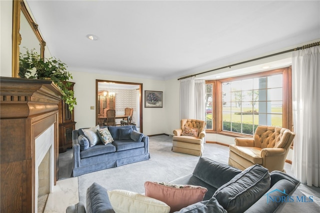 living room with crown molding and light colored carpet