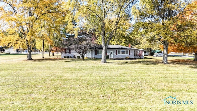 view of front of home with a front yard