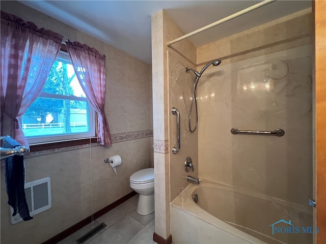 bathroom featuring tile walls, tile patterned flooring,  shower combination, and toilet