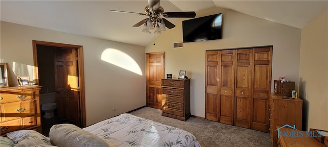 carpeted bedroom featuring lofted ceiling and ceiling fan