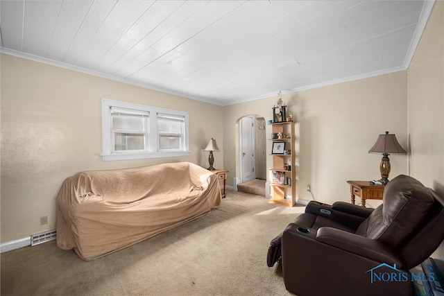 carpeted living room with crown molding