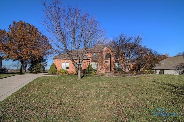 view of front of property with a front lawn