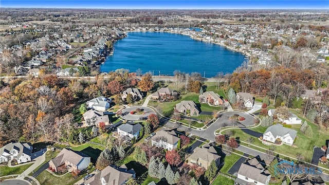 bird's eye view with a residential view and a water view