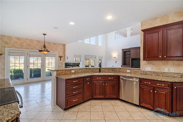 kitchen with light tile patterned floors, light stone counters, a peninsula, a sink, and stainless steel dishwasher