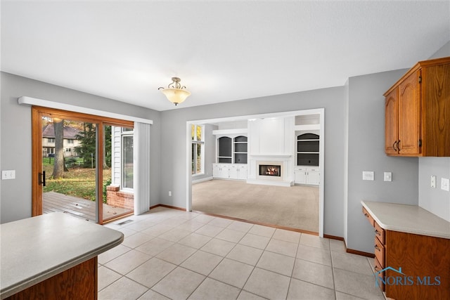 kitchen with light tile patterned floors