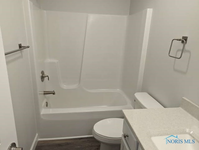 full bathroom featuring toilet, shower / tub combination, vanity, and hardwood / wood-style floors