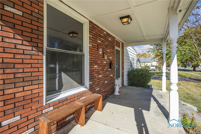 view of patio featuring a porch