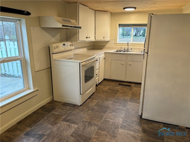 kitchen with white cabinetry, white appliances, sink, and extractor fan