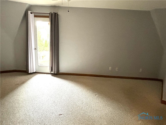 spare room featuring carpet flooring