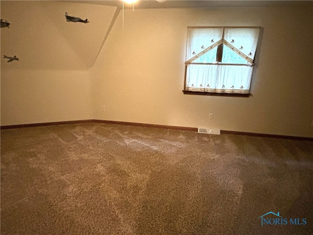 bonus room with carpet