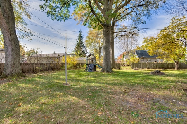 view of yard featuring a playground