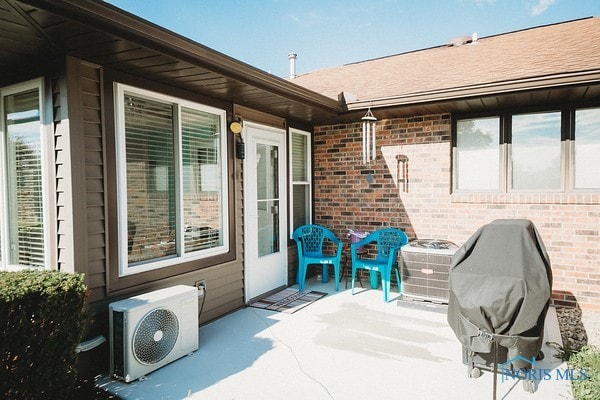 view of patio / terrace with ac unit