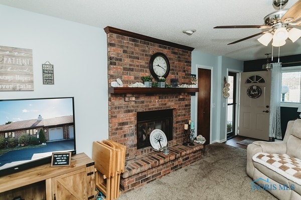 carpeted living room featuring ceiling fan and a brick fireplace