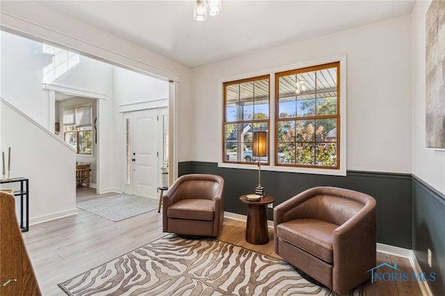 sitting room with light hardwood / wood-style floors