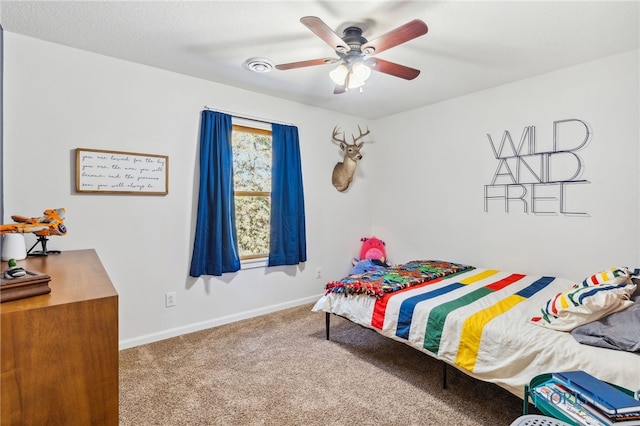 carpeted bedroom with ceiling fan