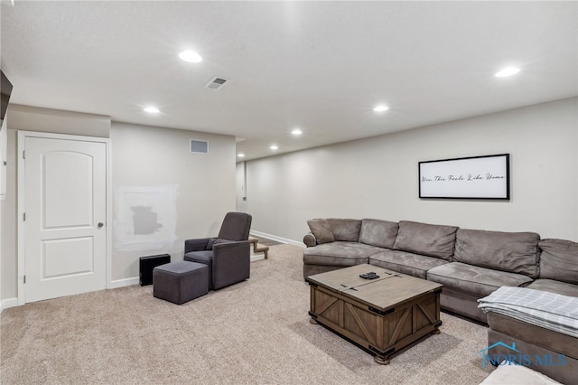 living room featuring light colored carpet