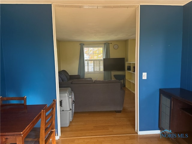 living room with light hardwood / wood-style flooring