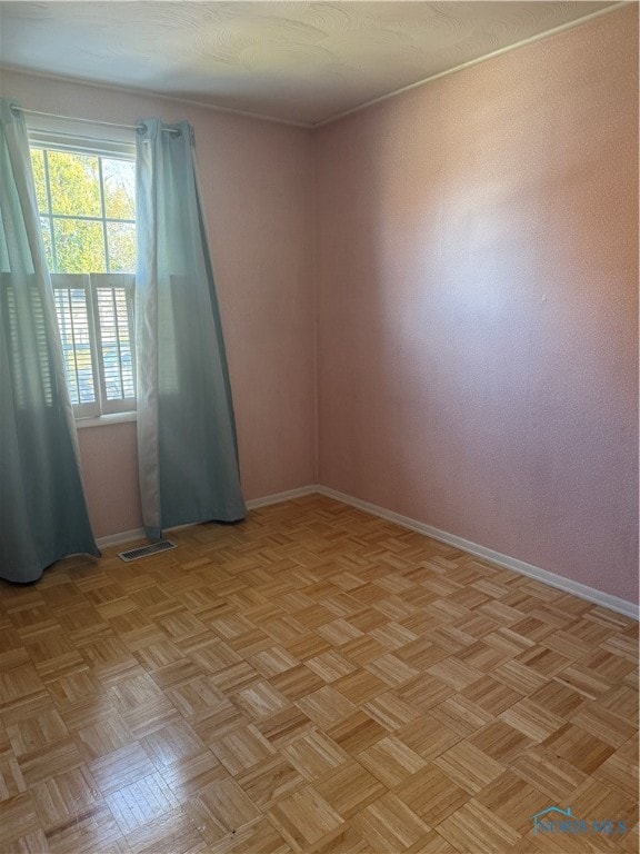 empty room featuring light parquet floors