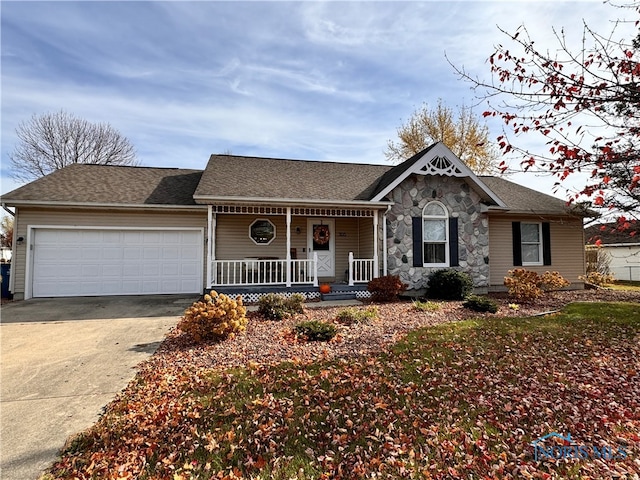 ranch-style home featuring a garage and a porch