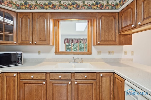 kitchen with dishwasher and sink