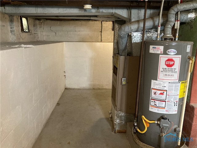 utility room featuring gas water heater