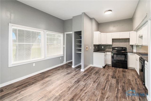 kitchen with black appliances, white cabinets, decorative backsplash, and dark hardwood / wood-style flooring