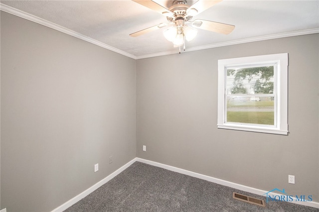 unfurnished room with ornamental molding, carpet floors, and ceiling fan