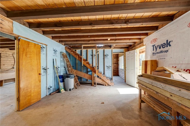 basement featuring wooden ceiling