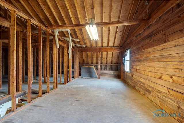 misc room featuring lofted ceiling